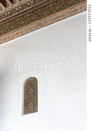 Lonely window in a white wall. Bahia Palace. Marrakesh. Morocco. Lonely window in a white wall. Bahia Palace. Marrakesh. Morocco. 124557052