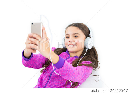 cheerful teen girl making selfie on phone on background. photo of teen girl making selfie on phone cheerful teen girl making selfie on phone on background. photo of teen girl making selfie on phone 124557547
