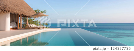 Thatched-roof cabana by an infinity pool overlooking a serene ocean. A tranquil scene featuring a cabana with thatched roof near a luxurious pool. Summer vacation concept, warm summer vibes 124557756