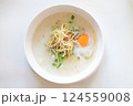 Delicious Asian Rice Porridge (Congee) with Egg and Toppings 124559008