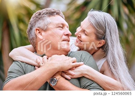 Senior couple, travel and hug in nature for love, support and care outdoor on retirement vacation for health and wellness. Elderly man and women happy about commitment, marriage and quality time Senior couple, travel and hug in nature for love, support and care outdoor on retirement vacation for health and wellness. Elderly man and women happy about commitment, marriage and quality time 124560065