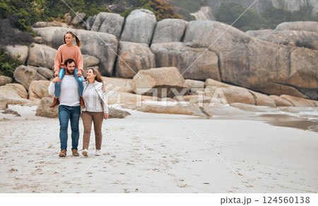 Family, walking and beach, travel and outdoor, mother and father with child spending quality time by the ocean. Love, together and man with woman and girl, parents bonding with kid out in nature. Family, walking and beach, travel and outdoor, mother and father with child spending quality time by the ocean. Love, together and man with woman and girl, parents bonding with kid out in nature. 124560138