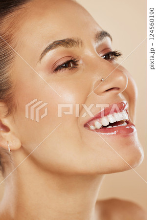 Beauty, makeup and skincare for woman happy after spa facial for natural glow and healthy skin in studio. Female model with smile for dermatology, wellness and health during self care with cosmetics Beauty, makeup and skincare for woman happy after spa facial for natural glow and healthy skin in studio. Female model with smile for dermatology, wellness and health during self care with cosmetics 124560190