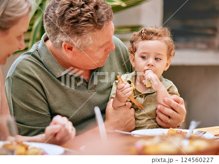 Family, lunch and grandparents have food with child at home for happy bonding meal together. Senior grandmother, grandpa and young kid at family home eating at dining table in summer. Family, lunch and grandparents have food with child at home for happy bonding meal together. Senior grandmother, grandpa and young kid at family home eating at dining table in summer. 124560227