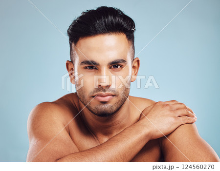 Beauty, skincare and face portrait of man on blue studio background. Health, dermatology and wellness of male model from India with serious facial expression, beard hair or glowing and healthy skin. Beauty, skincare and face portrait of man on blue studio background. Health, dermatology and wellness of male model from India with serious facial expression, beard hair or glowing and healthy skin. 124560270