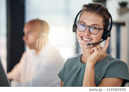 Call center, telemarketing and employee with smile for customer service, support and online help. Communication, consulting and portrait of a happy consultant in a crm office for business on the web Call center, telemarketing and employee with smile for customer service, support and online help. Communication, consulting and portrait of a happy consultant in a crm office for business on the web 124560308