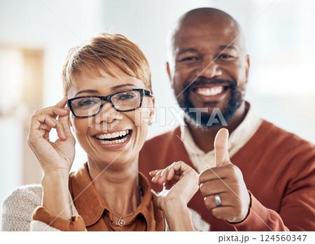 Black woman, man and thumbs up for vision, eyes healthcare or glasses shopping customer for optometry glasses. Smile portrait, mature people and like hands for fashion prescription or insurance lens Black woman, man and thumbs up for vision, eyes healthcare or glasses shopping customer for optometry glasses. Smile portrait, mature people and like hands for fashion prescription or insurance lens 124560347