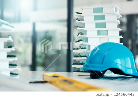 Building model on table, construction design industry and safety helmet for industrial real estate job. 3d plastic apartment architecture project, engineering career and contractor equipment tools Building model on table, construction design industry and safety helmet for industrial real estate job. 3d plastic apartment architecture project, engineering career and contractor equipment tools 124560448