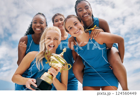 Women sports trophy, team portrait below and girl happiness smile for winning sport competition. Woman together happy, winner collaboration success and netball teamwork celebration for champion group Women sports trophy, team portrait below and girl happiness smile for winning sport competition. Woman together happy, winner collaboration success and netball teamwork celebration for champion group 124560449