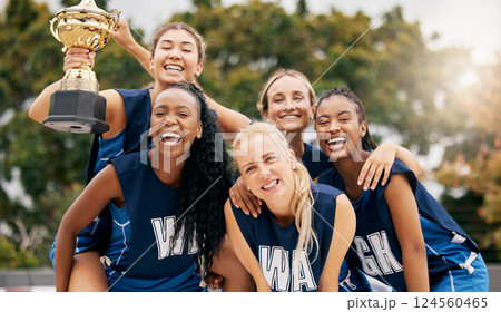 Netball game, team sports and trophy winner in sport competition on court, collaboration for winning and teamwork for success in event. Women athlete celebrate prize and champion achievement together Netball game, team sports and trophy winner in sport competition on court, collaboration for winning and teamwork for success in event. Women athlete celebrate prize and champion achievement together 124560465