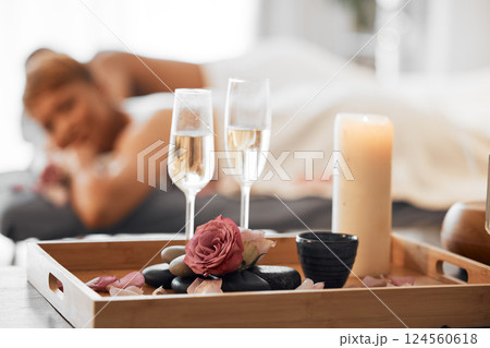 Champagne, spa massage and couple relax in zen, health and wellness salon, romance and body pamper treatment. Luxury, massage and wine at spa by woman and man enjoy peace, cosmetic and stress relief Champagne, spa massage and couple relax in zen, health and wellness salon, romance and body pamper treatment. Luxury, massage and wine at spa by woman and man enjoy peace, cosmetic and stress relief 124560618