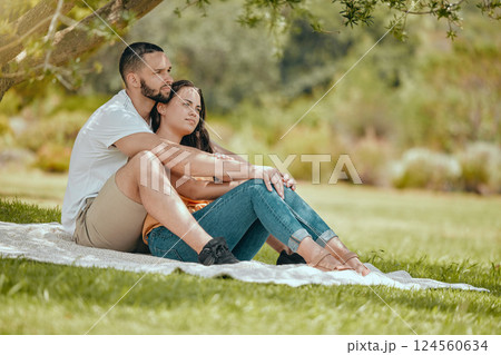 Relax, love and couple by tree in park for peace, summer and wellness date together. Happy, hug and health with man and woman lying on grass with blanket for spring, nature and support lifestyle Relax, love and couple by tree in park for peace, summer and wellness date together. Happy, hug and health with man and woman lying on grass with blanket for spring, nature and support lifestyle 124560634