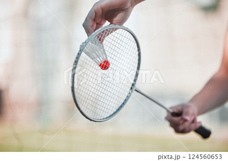 Sports, badminton and shuttlecock with racket and hands of woman training for games, competition and health. Match, workout and exercise with athlete ready to serve for goal, fitness and action Sports, badminton and shuttlecock with racket and hands of woman training for games, competition and health. Match, workout and exercise with athlete ready to serve for goal, fitness and action 124560653