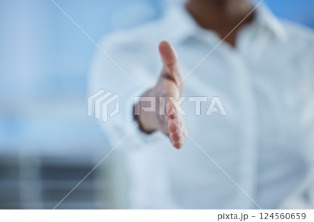 Business, hands and gesture for handshake, deal or agreement for partnership, b2b or thank you at the office. Corporate employee stretching hand for welcome, greeting or hiring at the workplace 124560659