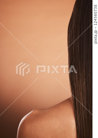 Beauty, hair care and skincare with back of woman isolated on brown studio background. Wellness, health and rear view of female model with long, healthy and beautiful, gorgeous hair or hair treatment Beauty, hair care and skincare with back of woman isolated on brown studio background. Wellness, health and rear view of female model with long, healthy and beautiful, gorgeous hair or hair treatment 124560738