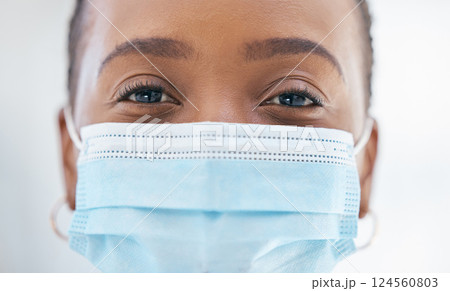Face portrait, covid and black woman in mask for lockdown, flu season or quarantine. Health, safety and young female in compliance to covid 19 or corona virus rules, regulations or policy closeup. 124560803