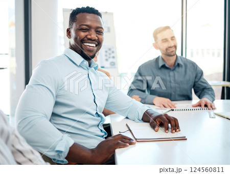 Meeting, corporate and portrait of African businessman sitting in the office boardroom with his team. Happy, smile and professional black man planning a company strategy or project in conference room 124560811