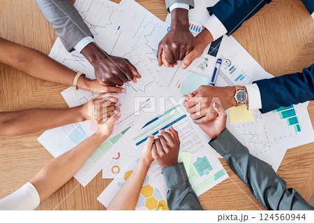 Business people, reports and team holding hands above for meeting, planning or unity at the office. Hand of corporate group in teamwork, strategy or marketing for collaboration, support and trust Business people, reports and team holding hands above for meeting, planning or unity at the office. Hand of corporate group in teamwork, strategy or marketing for collaboration, support and trust 124560944