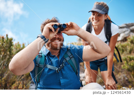 Hiking, nature and couple with binoculars, happy, smile and relax while watching, looking and explore together. Friends, freedom and hikers bond by woman and man laugh, search and enjoy scenic view Hiking, nature and couple with binoculars, happy, smile and relax while watching, looking and explore together. Friends, freedom and hikers bond by woman and man laugh, search and enjoy scenic view 124561430