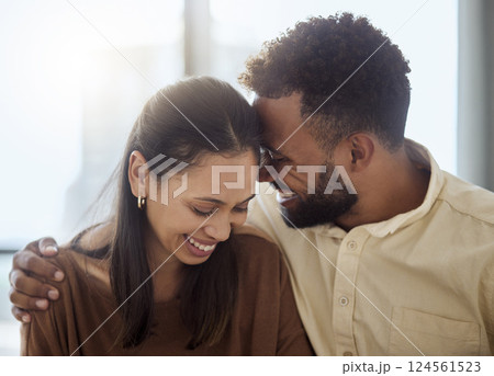 Couple, black people and love hug of a girlfriend and boyfriend with a smile together. Anniversary of happiness of a woman and man in a home laughing at a funny joke with happy bonding and affection 124561523
