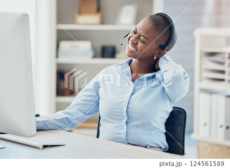 Black woman, neck pain and call center agent on office computer in crm consulting or contact us telemarketing company. Stress, burnout and muscle tension for worker on b2b customer support technology Black woman, neck pain and call center agent on office computer in crm consulting or contact us telemarketing company. Stress, burnout and muscle tension for worker on b2b customer support technology 124561589
