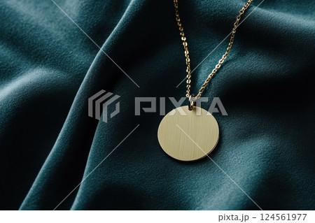 Minimalistic pendant necklace resting on soft velvet showcasing elegant design and clean lighting 124561977