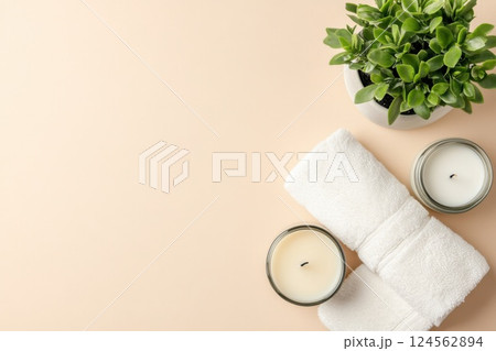 Elegant bathroom decor with candles and towels for a soothing atmosphere Elegant bathroom decor with candles and towels for a soothing atmosphere 124562894