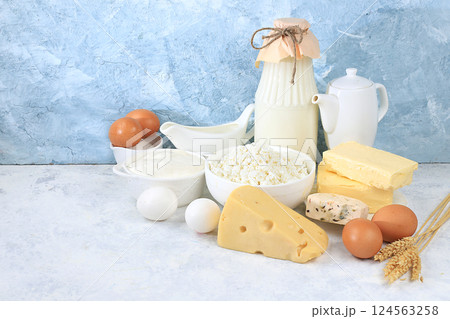 Assortment of fresh dairy products, healthy breakfast with ingredients, natural nutrition concept, maintaining healthy intestinal microflora, diet food, rustic table, selective focus 124563258