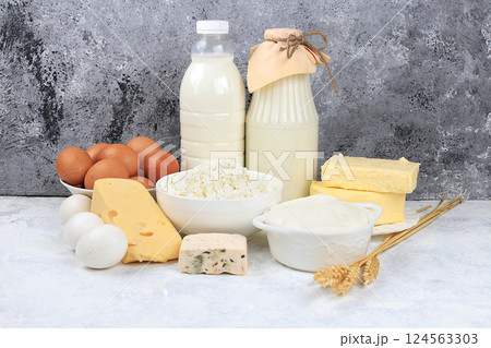 Assortment of fresh dairy products, healthy breakfast with ingredients, natural nutrition concept, maintaining healthy intestinal microflora, diet food, rustic table, selective focus 124563303