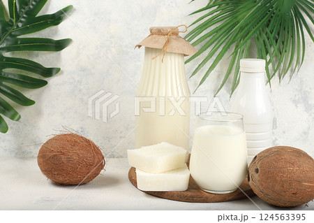 Coconut vegan alternative milk lactose and gluten free, allergy free, healthy eating concept, maintaining healthy gut microflora, diet nutrition, weight loss, selective focus Coconut vegan alternative milk lactose and gluten free, allergy free, healthy eating concept, maintaining healthy gut microflora, diet nutrition, weight loss, selective focus 124563395