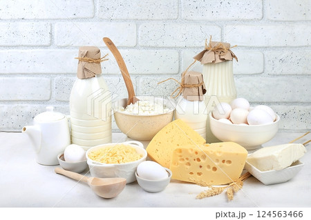 Assorted fresh dairy products, natural food concept, healthy breakfast with ingredients, maintaining healthy intestinal microflora, diet food, rustic table, selective approach 124563466