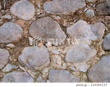 Stone ancient wall background abstract 124564137