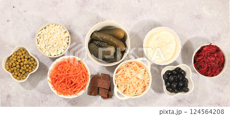 Food background with probiotics, advertising banner, healthy natural food concept, sauerkraut, kimchi, beets, olives, peas, yogurt, cream, chocolate, healthy foods for your health, top view, selective 124564208