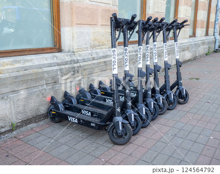 Scooters for rent. resort business. Active lifestyle. Two-wheeled transport. Electric transport. Care for the environment 124564792