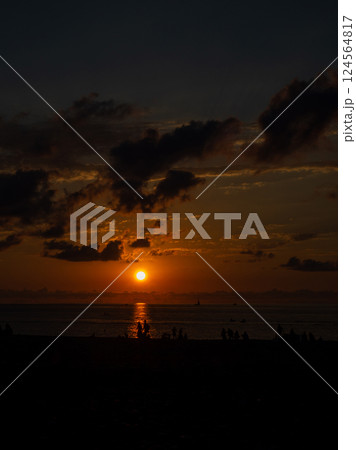 Sunset over the sea in a resort place. Evening on the beach. Beautiful orange sunse . Black Sea coast. Rest on the sea Sunset over the sea in a resort place. Evening on the beach. Beautiful orange sunse . Black Sea coast. Rest on the sea 124564817