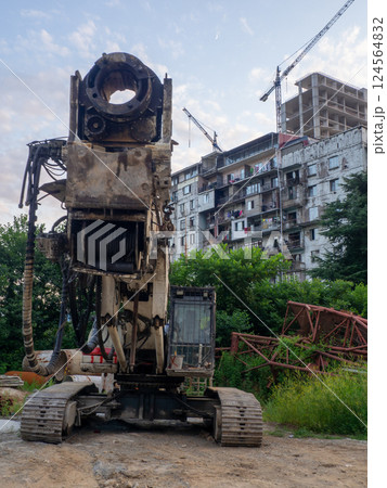 Construction equipment. Heavy machines for work. Driving piles. High-rise buildings. Not in working order. Construction industry. Construction equipment. Heavy machines for work. Driving piles. High-rise buildings. Not in working order. Construction industry. 124564832