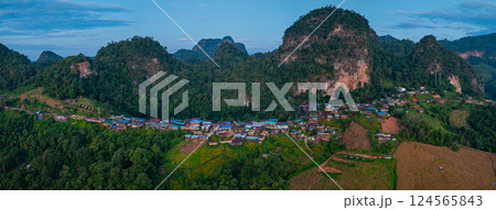 Aerial view of stunning sunrise above a small village 124565843