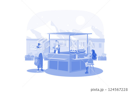 People enjoy local food and discover the local culture 124567228