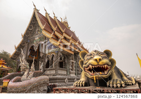 The sculpture of holy monster named '4 ears and 5 eyes' in Wat Phra That Doi Khao Kwai temple of Chiang Rai province, Thailand. 124567868