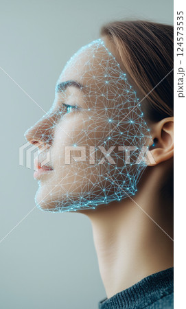 conceptual representation of AI facial recognition with digital network overlay 124573535