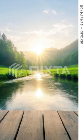 peaceful river flows through green valley at sunrise 124574759