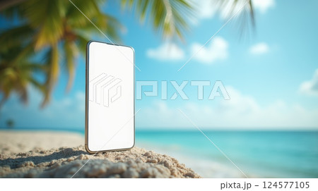 Smartphone with blank white screen standing on sandy beach with tropical background. Mockup for mobile app or website presentation, copy space 124577105
