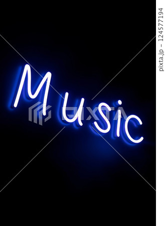 Neon sign with the word music in blue glowing letters on a black background 124577194