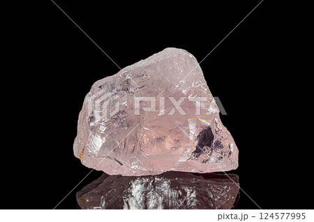 Rose quartz on dark background Rose quartz on dark background 124577995