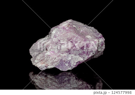 Lepidolite on dark background Lepidolite on dark background 124577998