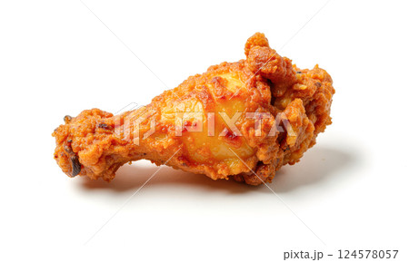 Crispy fried chicken wing close-up on white background golden brown breaded piece delicious fast food snack crunchy texture. appetizing poultry cuisine Crispy fried chicken wing close-up on white background golden brown breaded piece delicious fast food snack crunchy texture. appetizing poultry cuisine 124578057
