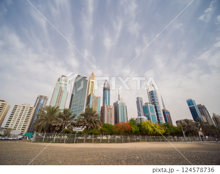 Panorama of tall Skyscrapers in skyline of Dubai. Panorama of tall Skyscrapers in skyline of Dubai. 124578736
