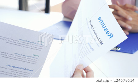 Job Interview with headhunter agent and applicant. Job HR applicants having an interview with Human resource manager jobs interviewing with confident candidate at business firm office give cv resume 124579514