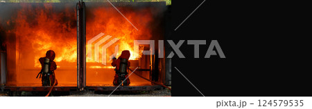 Firefighter Rescue training in fire fighting extinguisher. Firefighter fighting with flame using fire hose chemical water foam spray engine. Fireman wear hard hat, safety suit uniform for protection Firefighter Rescue training in fire fighting extinguisher. Firefighter fighting with flame using fire hose chemical water foam spray engine. Fireman wear hard hat, safety suit uniform for protection 124579535