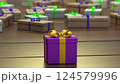 Purple Gift Box with Yellow Bow on Wooden Background. 124579996